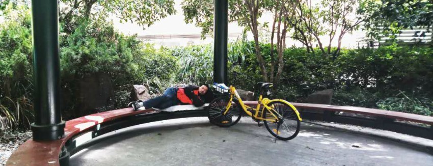Man sleeping in Chinese park
